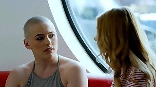 Busty Lesbian With Bald Head Is Making Love With A Sexy Girl, On The Couch